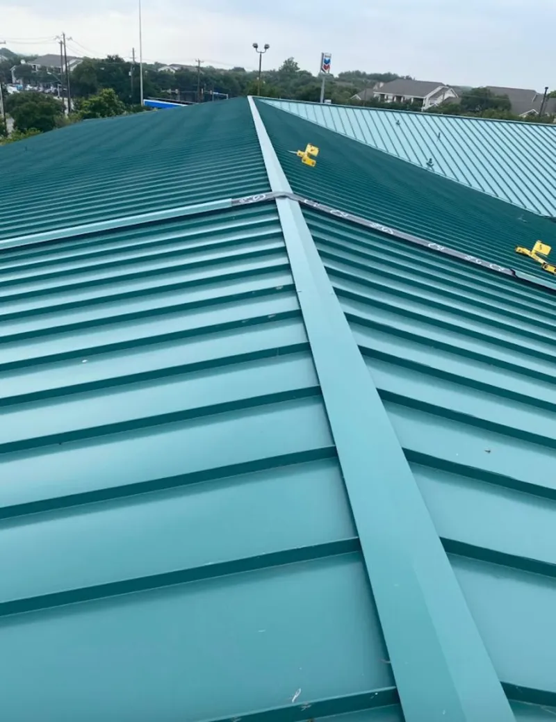 Green commercial metal roof ridge and valley for Metal Roof Repair in West Pennsboro